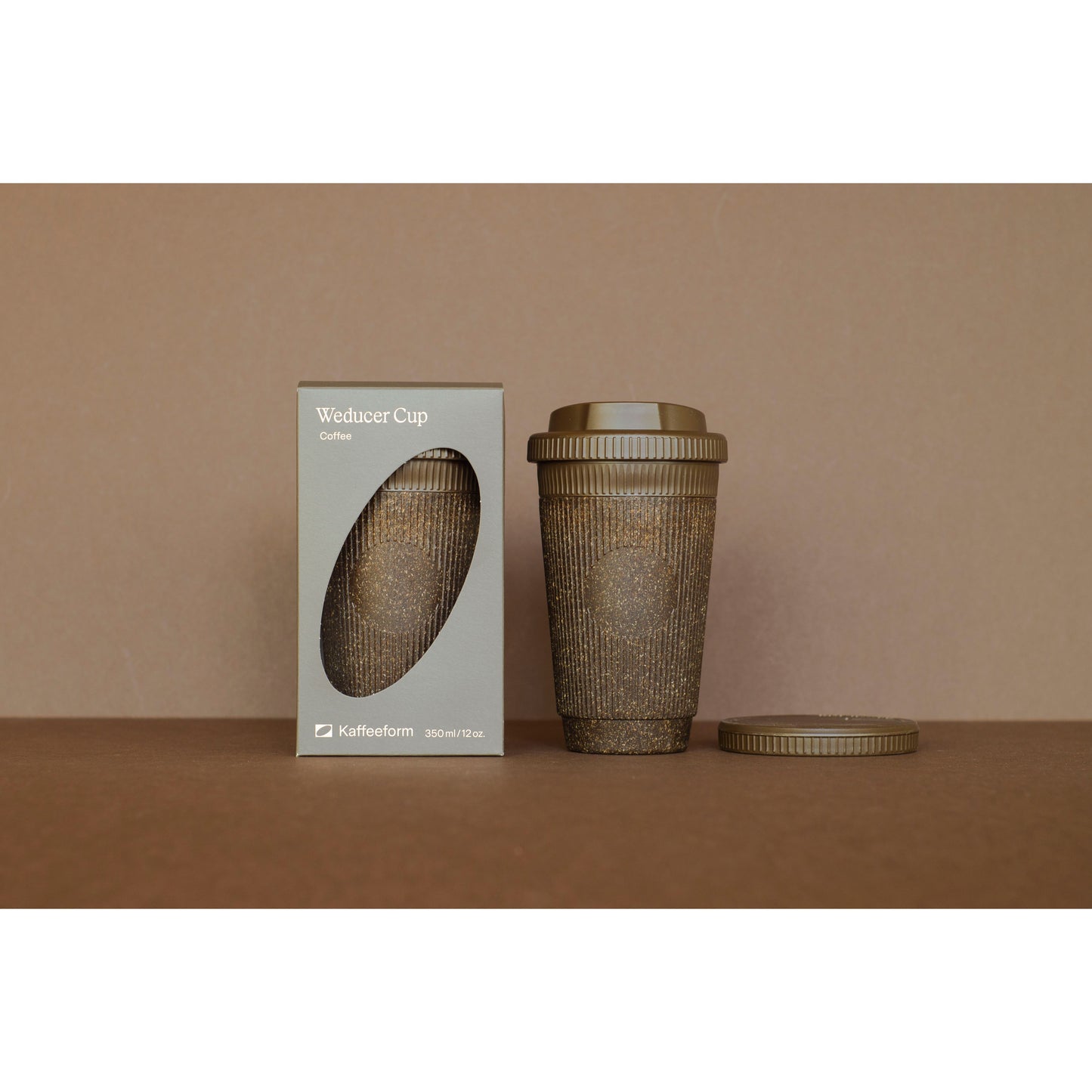 Reusable cup made of coffee grounds Weducer