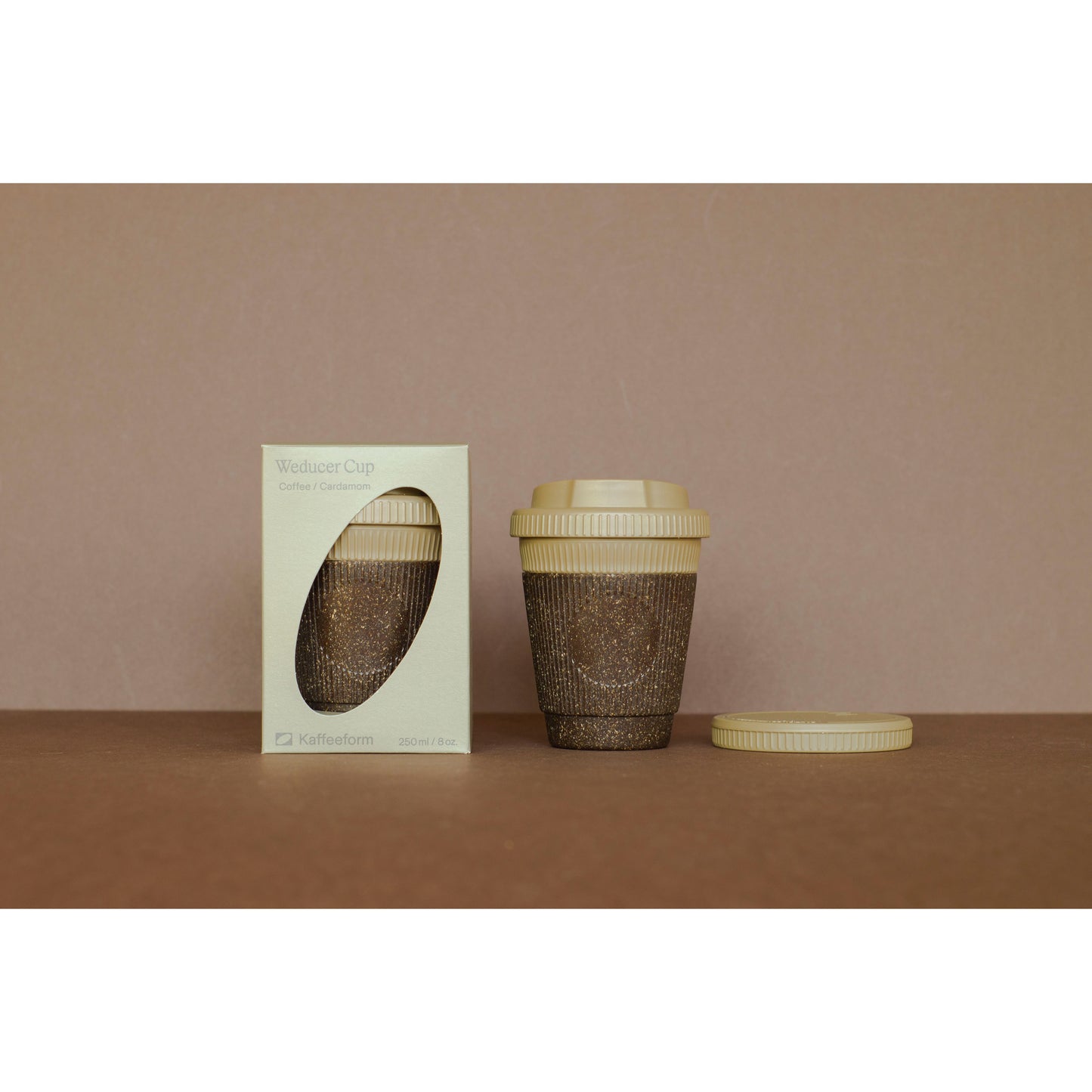 Reusable cup made of coffee grounds Weducer