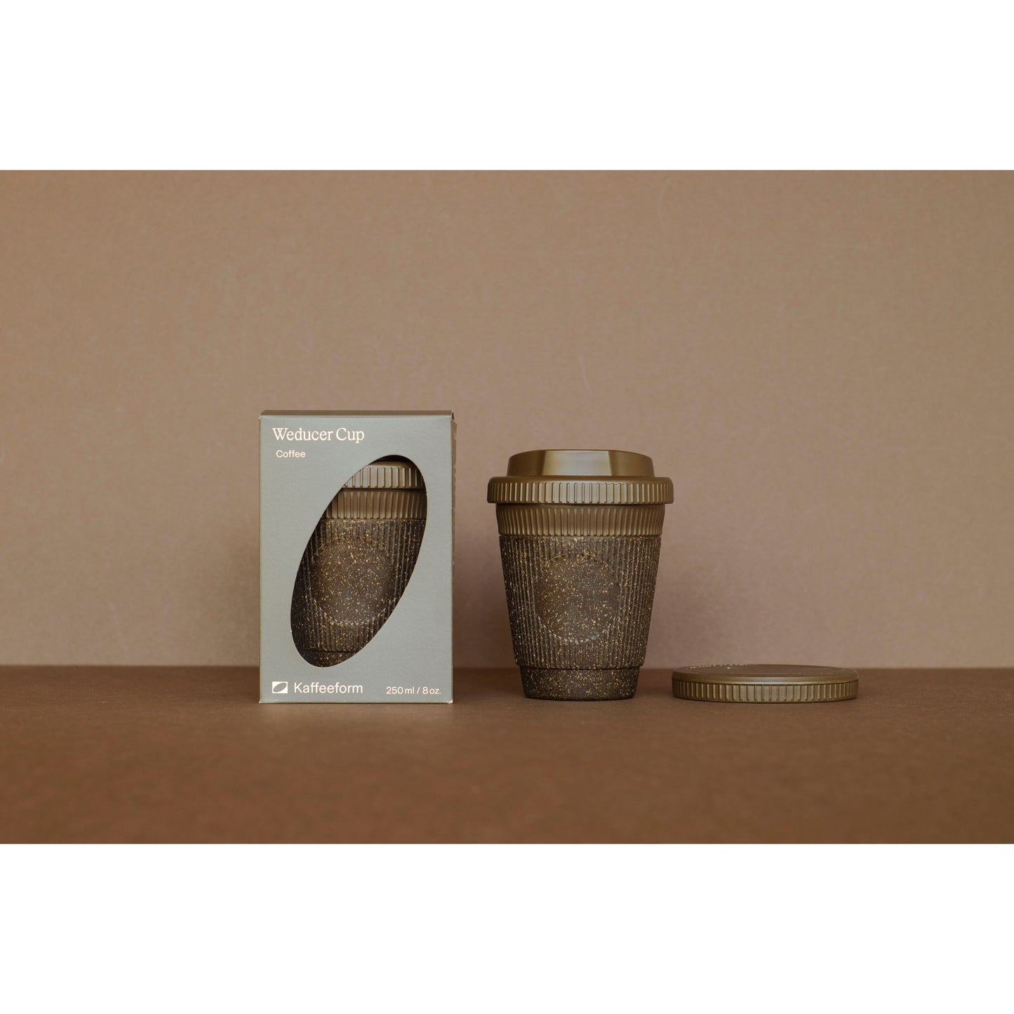 Reusable cup made of coffee grounds Weducer