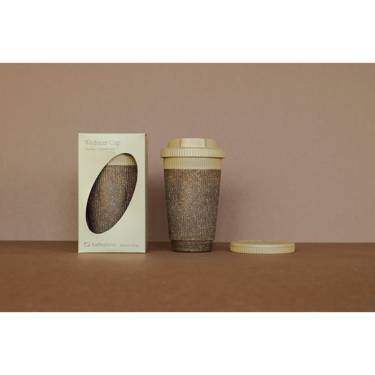 Reusable cup made of coffee grounds Weducer